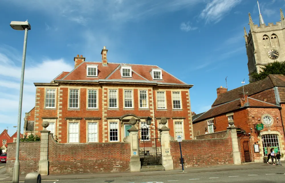 Photo de Mur de la maison Brownstone - Historic England / David Lovell